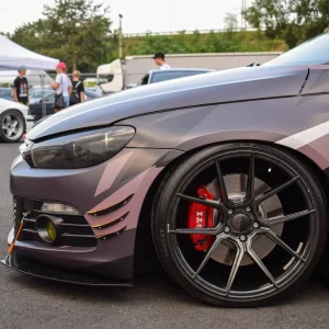 front quarter of a car wrapeed with purple custom car wrap